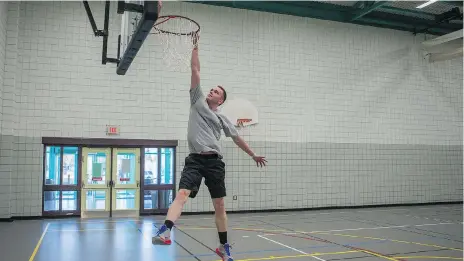  ?? KAYLE NEIS ?? Noah Capyk plays basketball in the Lakewood Civic centre gym in Saskatoon on Wednesday. The city is proposing a $5 hike to recreation passes in next year’s budget. The cost of Leisure Cards was reduced in 2015 from $75 to $45 for a single adult.