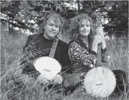  ??  ?? Béla Fleck and Abigail Washburn are touring with their one- year- old son Juno.