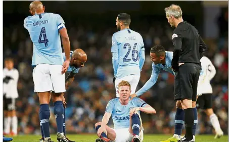  ?? Reuters ?? Yeah, it hurts: Manchester City’s Kevin De Bruyne after sustaining an injury during the League Cup match against Fulham on Thursday.—