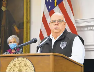  ?? PAMELA WOOD/BALTIMORE SUN ?? Maryland Gov. Larry Hogan holds a news conference Wednesday at the State House in Annapolis.