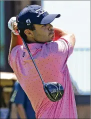  ??  ?? Austin Squires, from Kentucky, tees off during the U.S. Open sectional qualifier at the Springfiel­d Country Club on Monday. Squires shot a 69 in his first round.