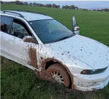  ??  ?? A car doing burnouts at Palmerston North’s Kelvin Grove Cemetery got stuck.