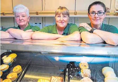  ?? Picture: Steven Brown. ?? Stuart’s bakery shop workers get ready for their last day at the Glenrothes town centre store. From left: Simone Proctor, Janette Jenson and Wendy Markward.