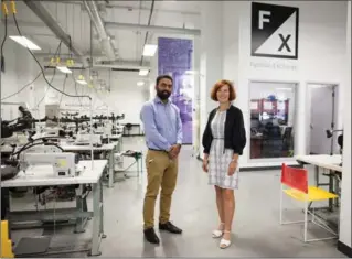  ?? PHOTOS BY NICK KOZAK, FOR THE TORONTO STAR ?? Factory head Gagin Singh, left, and director Marilyn McNeil-Morin, right, at the George Brown - Fashion Exchange.