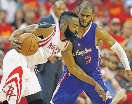  ?? Houston Chronicle ?? After eight seasons as Western Conference foes, Chris Paul (right) will team up with James Harden in what arguably may be the NBA’s best backcourt. But will it be enough for them to reach the level of NBA champion Golden State?