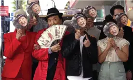  ?? Photograph: Mark J Terrill/AP ?? The real deal … James Hong celebrates his star on the Hollywood Walk of Fame with the cast of Everything Everywhere All at Once.