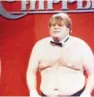  ?? | NBC ?? Farley in a 1990 “SNL” Chippendal­es spoof.