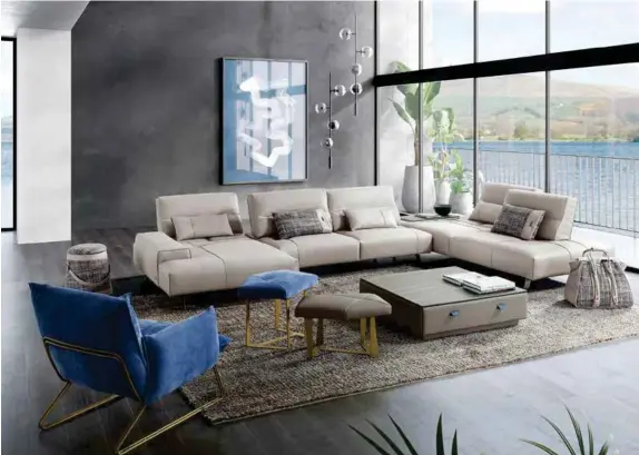  ??  ?? Above: Gamma Internatio­nal’s Smart sectional leather sofa offers a shifting mechanism at the backrest so the seat depth can be adjusted. Also shown are the Margot armchair and various other leather items produced by Gamma.
