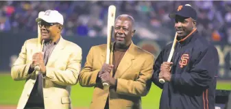  ?? Darryl Bush / The Chronicle 2002 ?? Willie Mays (left), Hank Aaron and Barry Bonds — three of the greatest home run hitters of all time — pose at Pacific Bell Park (now Oracle Park) in 2002 after Bonds joined the 600 club.