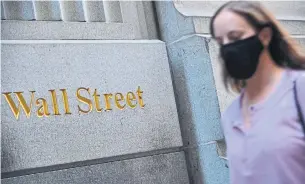  ?? ANGELA WEISS AFP VIA GETTY IMAGES ?? As the pandemic set in, Wall Street banks saw a rush of hospitals draw down existing credit lines and were inundated with requests for new or expanded financing.