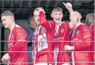  ?? ?? Thumbs up En route to lifting the Highland League trophy. Photos: Graeme Youngson