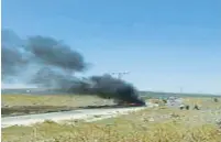  ?? (SANA) ?? SMOKE TRAILS from the scene of an alleged IDF attack on a vehicle in Hader, Syria, yesterday.