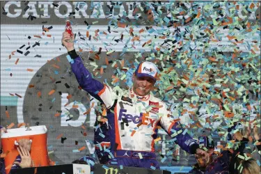  ?? RALPH FRESO - THE ASSOCIATED PRESS ?? Denny Hamlin celebrates in Victory Lane after winning the NASCAR Cup Series auto race Sunday, Nov. 10, 2019, in Avondale, Ariz.