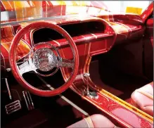  ?? AP/JAE C. HONG ?? The interiors of customized vehicles like El Rey, a 1963 Chevrolet Impala, have been given the royal treatment by accomplish­ed artists such as Albert de Alba Sr.