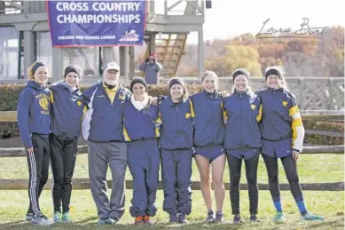  ?? BY LAURA BURT ?? The outstandin­g 2017 RCHS girls' cross country team consists of (left to right) Caragh Heverly, newly crowned state champion Rachel Weghorst, Coach Kenny Burt, Jacklyn Humphries, Brooke Athelli, Skylar Culbertson, Savannah Hensley, Danielle Fryant...