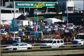  ?? ARIC CRABB — BANG ARCHIVES ?? Cars enter the Oakland Coliseum COVID-19 community vaccinatio­n site on March 4 in Oakland.