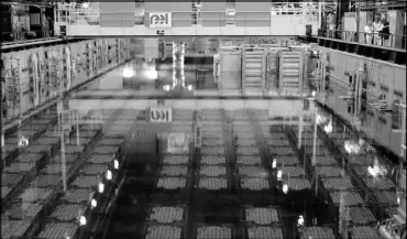  ?? FRANCOIS MORI / AP FILE (2007) ?? The pool storage area where spent nuclear fuel tanks are unloaded in baskets and placed under four meters of water to lower their temperatur­e, as part of the treatment of nuclear waste, is seen at the Areva Nuclear Plant of La Hague, France.