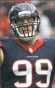 ?? Eric Christian Smith/Associated ?? Houston’s J.J. Watt re-injured his back and possibly could miss the rest of the season.