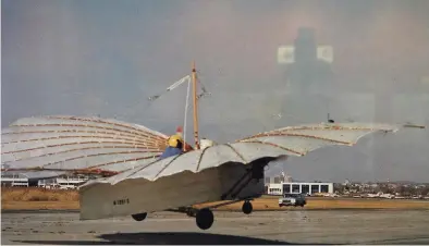  ?? Brian A. Pounds / Hearst Connecticu­t Media ?? A photograph by Morgan Kaolian of Andy Kosch flying his Gustave Whitehead plane at Sikorsky Airport in Stratford 25 years ago.