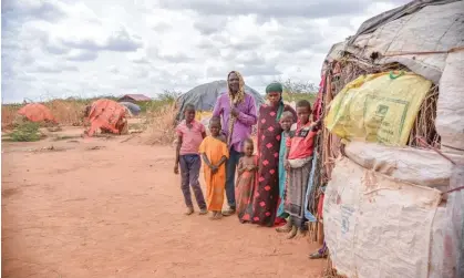  ?? Photograph: Lucy Makori/MSF ?? Somali farmer Borow Ali Khamis, 50, with his family at the Dagahaley refugee camp in Kenya. He says: “I left Somalia because of the drought after I lost everything.”