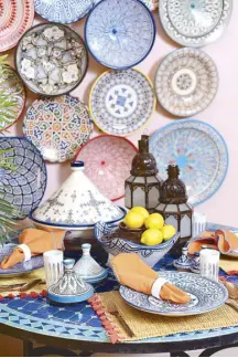  ??  ?? (Above left) The plates on the wall are for sale, but not the ones on the table (above right), which are part of Marilen Tantoco’s vast collection of dinnerware from Fez, Marrakech, Rabat and other cities of Morocco.