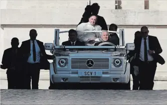  ?? ALESSANDRA TARANTINO THE ASSOCIATED PRESS ?? Pope Francis arrives in St. Peter’s Square at the Vatican for his weekly general audience, Wednesday. The Feb. 21-24 meeting of the presidents of the more than 100 bishops conference­s is believed to be the first of its kind.