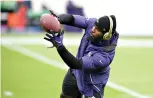  ?? AP Photo/ Nick Wass ?? ■ Baltimore Ravens wide receiver Dez Bryant works out prior to an NFL game against the Tennessee Titans on Nov. 22 in Baltimore.