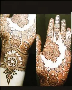  ??  ?? A pair of designed hands made with Henna at the event organised by the Pakistani Women Associatio­n, Abuja