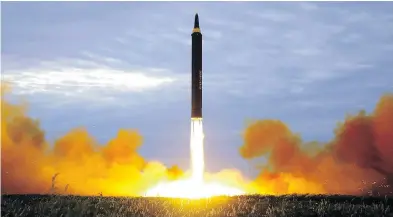  ?? KOREAN CENTRAL NEWS AGENCY / KOREA NEWS SERVICE VIA AP FILES ?? The North Korean government shows last week what was said to be the test launch of a Hwasong-12 intermedia­te range missile in Pyongyang, North Korea.