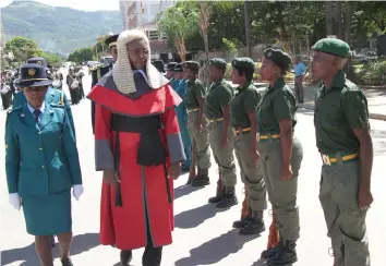  ??  ?? High Court Judge, Justice Charles Hungwe inspects a quarter gaurd mounted by Zimbabwe Republic Police and Zimbabwe Prison and Correction­al Services at the official opening of the legal year in Mutare on Monday