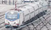  ?? MATT ROURKE/AP ?? President Biden is proposing a boost to U.S. infrastruc­ture, including new Amtrak funds.