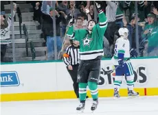  ?? GLENN JAMES/NHLI VIA GETTY IMAGES ?? Dallas Stars forward Jamie Benn scored the 3-on-3 overtime winner against Vancouver Thursday. Stars are shining under the new format.