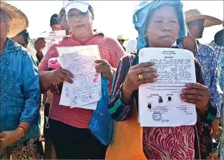  ?? FACEBOOK ?? Bit Traing commune chief Mach Chan on Tuesday appealed to Okhna Lanh Pheara and 77 families and urged them to find an acceptable solution to a land dispute.