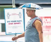  ?? ANDREW FRANCIS WALLACE TORONTO STAR ?? Toronto opened 15 emergency cooling centres this week as an option for residents without air-conditioni­ng or access to a cool space. The city is also providing masks at the cooling centres to help stop the spread of COVID-19 inside the facilities.