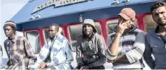  ?? | AP ?? MIGRANTS on the deck of a Spanish fishing vessel carrying 12 hopefuls rescued off the coast of Libya. There has been a surge in migrants trying to reach Spain and its territorie­s now that Italy has focused on stopping their entry.