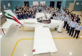  ?? Supplied photo ?? First Lastname
Emirates engineers proudly display the RV 12 plane they have built. —