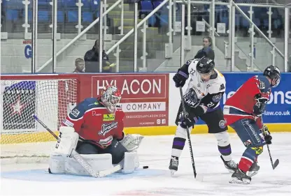  ?? Picture: Derek Black. ?? Stars goalie Pontus Sjogren, blocking a shot from Glasgow Clans’ Josh Gratton, made 150 saves in four games last weekend.