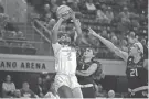  ?? HOWARD / USA TODAY SPORTS WILLIAM ?? Tennessee forward Rickea Jackson shoots in front of UWGB guard Cassie Schiltz (1) in the first round of the NCAA Tournament on Saturday.