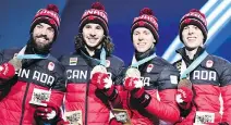  ?? DIMITAR DILKOFF/AFP/GETTY IMAGES ?? Charles Hamelin, Samuel Girard, Pascal Dion and Charle Cournoyer, bronze medallists in the men’s 5,000-metre relay. The Vancouver Games inspired Girard to become an Olympian.