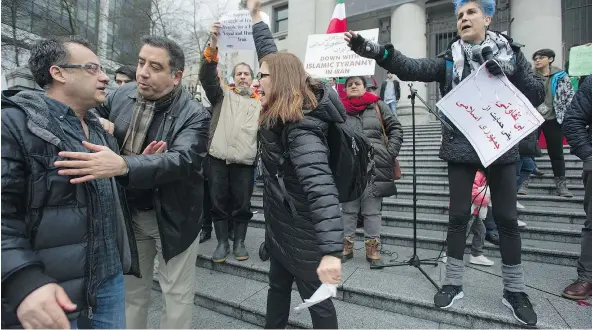  ?? JASON PAYNE ?? Competing rallies over the use of sanctions against Iran became heated at times at the Vancouver Art Gallery on Saturday.