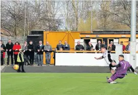  ??  ?? Easy does it Craig Moore clawed a goal back for Ayr after rounding Neil Parry