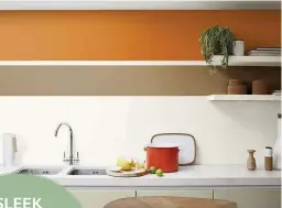  ??  ?? Inject some colour and personalit­y into a dark, narrow kitchen with a feature wall. Add a couple of floating shelves and display your favourite cookbooks, ceramics or potted plants
Active Orange and Spiced Honey matt emulsion,
£29.16 for 2.5L, Dulux