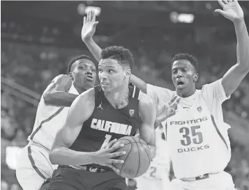  ?? STEPHEN R. SYLVANIE, USA TODAY SPORTS ?? Ivan Rabb, center, has no regrets entering the draft a year later. “Staying in school, I changed my mentality a lot,” he said. “I got way more mature off the court.”