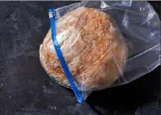  ?? Stacy Zarin Goldberg/Washington Post ?? The easiest way to defrost a frozen loaf of bread is to place it, still wrapped, on the counter for a few hours, and then crisp it in a 350- to 400-degree oven for a few minutes.