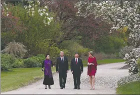  ?? (File Photo/AP/Yves Herman) ?? Belgium’s Queen Mathilde (from right), China’s President Xi Jinping, King Philippe and Chinese First Lady Peng Liyuan walk in March 2014 in the Royal Gardens of Laeken, Belgium.