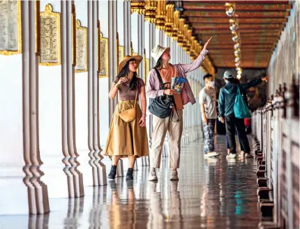  ?? ?? Chinese tourists visit the Grand Palace in Bangkok, Thailand, on 7 February