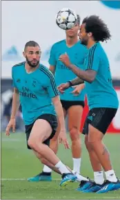  ??  ?? Benzema y Marcelo, a tope.