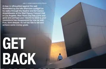  ?? JAE C. HONG/ASSOCIATED PRESS ?? A man is silhouette­d against the wall illuminate­d by the late afternoon sunlight as he walks through the Nadine and Ed Carson Amphitheat­er at the Walt Disney Concert Hall in Los Angeles. New Years Day has come and gone and perhaps your resolve to stick to your resolution­s has disappeare­d by now as well. If so, dont despair, its not too late to set and achieve some money goals.