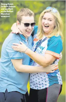  ?? KEVIN SCOTT ?? Strong finish: Jo-Anne Dobson and son Mark at the Belfast Marathon