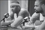  ?? AP photo ?? Carmelo Anthony, left, and Tyson Chandler answer questions during Knicks’ media day on Monday.